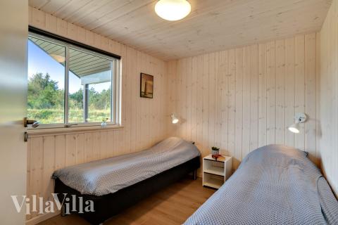 Eines der 8 Schlafzimmer im Luxusferienhaus Nr. 455