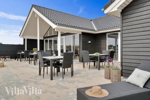 Das Luxusferienhaus Nr. 456 hat eine tolle Terrasse, die mit hochwertigen Gartenmöbeln für 20 Personen ausgestattet ist.