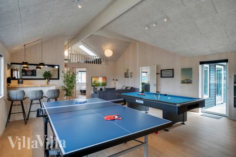 Neben den vielen schönen Stunden, die man im Poolbereich des Hauses verbringen kann, bietet das Luxusferienhaus 457 auch Spielevergnügen bei Billard/Tischtennis und Darts