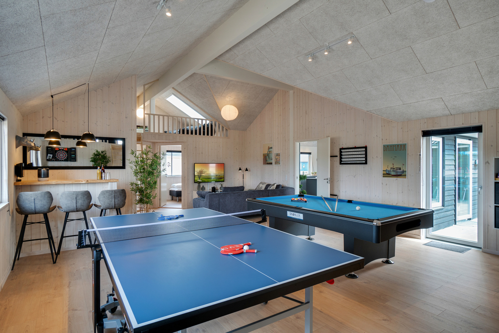 Neben den vielen schönen Stunden, die man im Poolbereich des Hauses verbringen kann, bietet das Luxusferienhaus 457 auch Spielevergnügen bei Billard/Tischtennis und Darts