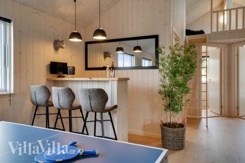 Die tollen Ferienhäuser sind unter anderem mit einer Bar ausgestattet, wie in diesem Luxusferienhaus 457 in Westjütland