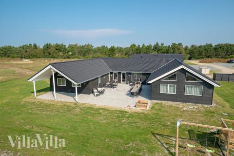 Dieses schöne Poolhaus Nr. 457 mit Platz für 20 Personen liegt in Westjütland