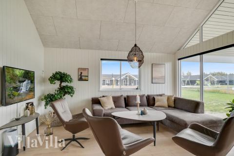 Aufenthaltsraum mit Platz für 18 im Luxusferienhaus Nr. 458.