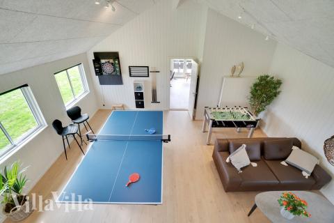 Neben den vielen schönen Stunden, die man im Poolbereich des Hauses verbringen kann, bietet das Luxusferienhaus 458 auch Spielevergnügen bei Billard/Tischtennis und Darts