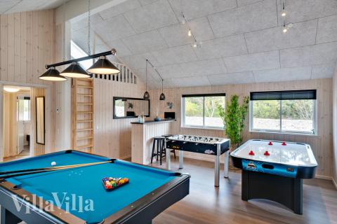 Neben den vielen schönen Stunden, die man im Poolbereich des Hauses verbringen kann, bietet das Luxusferienhaus 463 auch Spielevergnügen bei Billard/Tischtennis und Darts