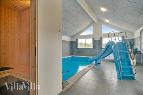 Genießen Sie die heiße Sauna im Luxusferienhaus Nr. 463 für 20 Personen