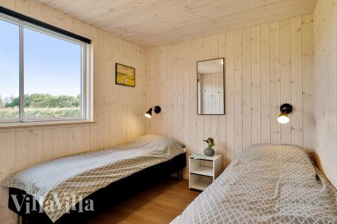 Eines der 7 Schlafzimmer im Luxusferienhaus Nr. 473