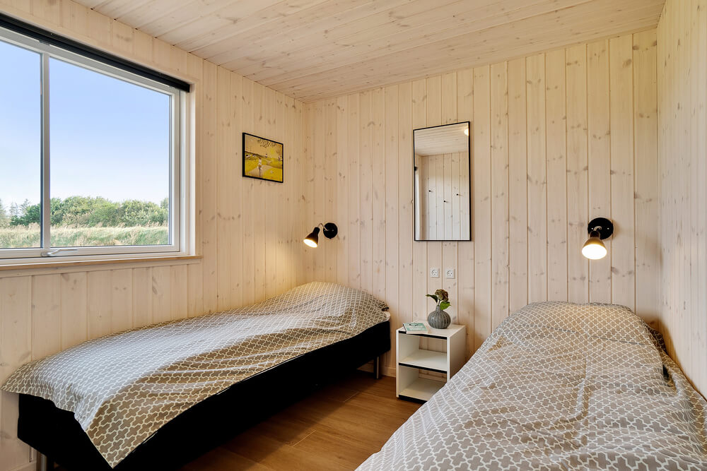 Eines der 7 Schlafzimmer im Luxusferienhaus Nr. 473