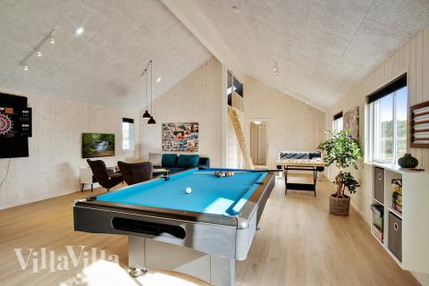 Neben den vielen schönen Stunden, die man im Poolbereich des Hauses verbringen kann, bietet das Luxusferienhaus 473 auch Spielevergnügen bei Billard/Tischtennis und Darts