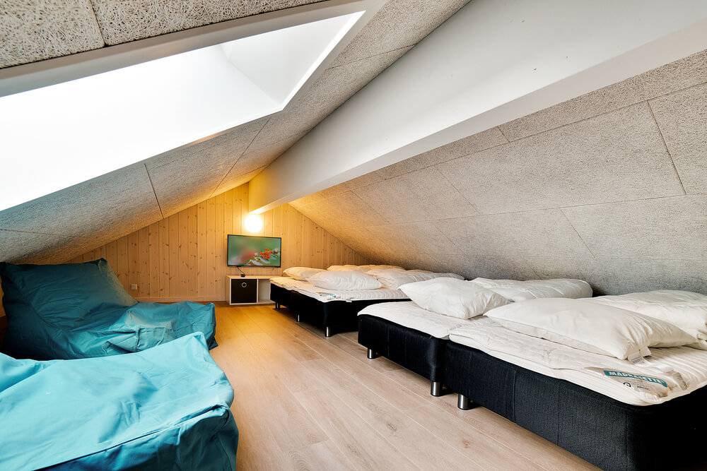 Der große ausgebaute Dachboden im Luxusferienhaus Nr. 473 für 18 Personen