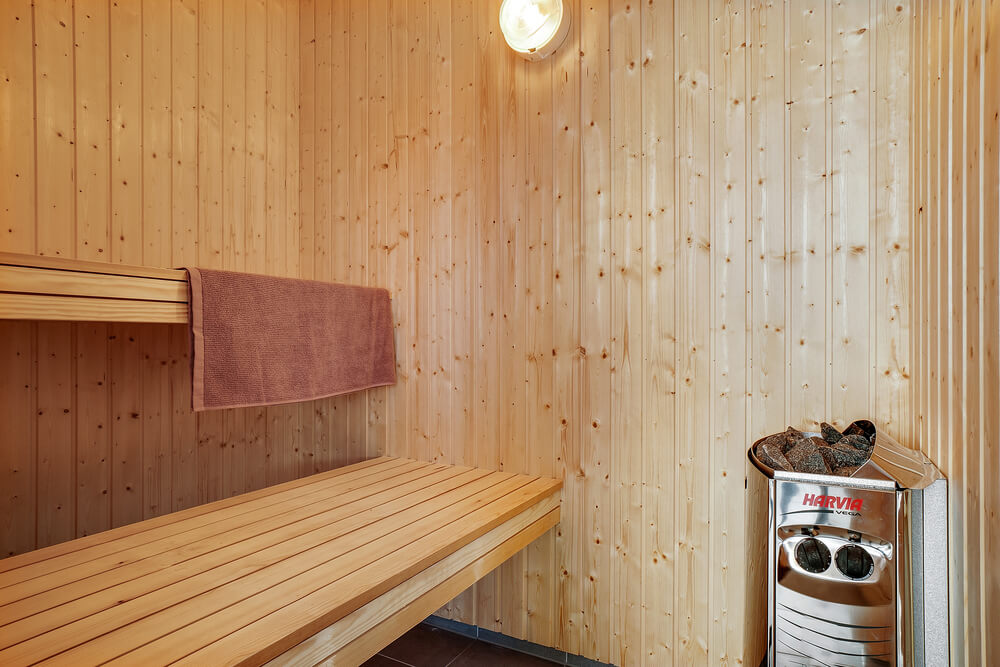 Genießen Sie die heiße Sauna im Luxusferienhaus Nr. 473 für 18 Personen