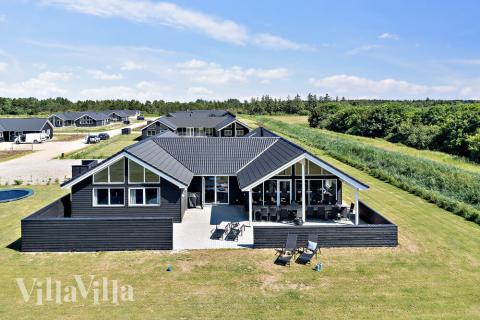 Dieses schöne Poolhaus Nr. 473 mit Platz für 18 Personen liegt in Westjütland