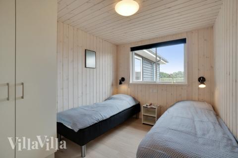 Eines der 12 Schlafzimmer im Luxusferienhaus Nr. 467