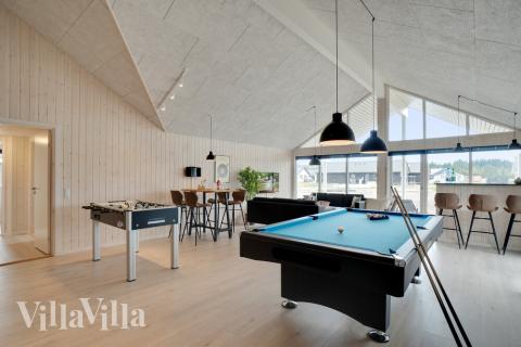 Neben den vielen schönen Stunden, die man im Poolbereich des Hauses verbringen kann, bietet das Luxusferienhaus 467 auch Spielevergnügen bei Billard/Tischtennis und Darts