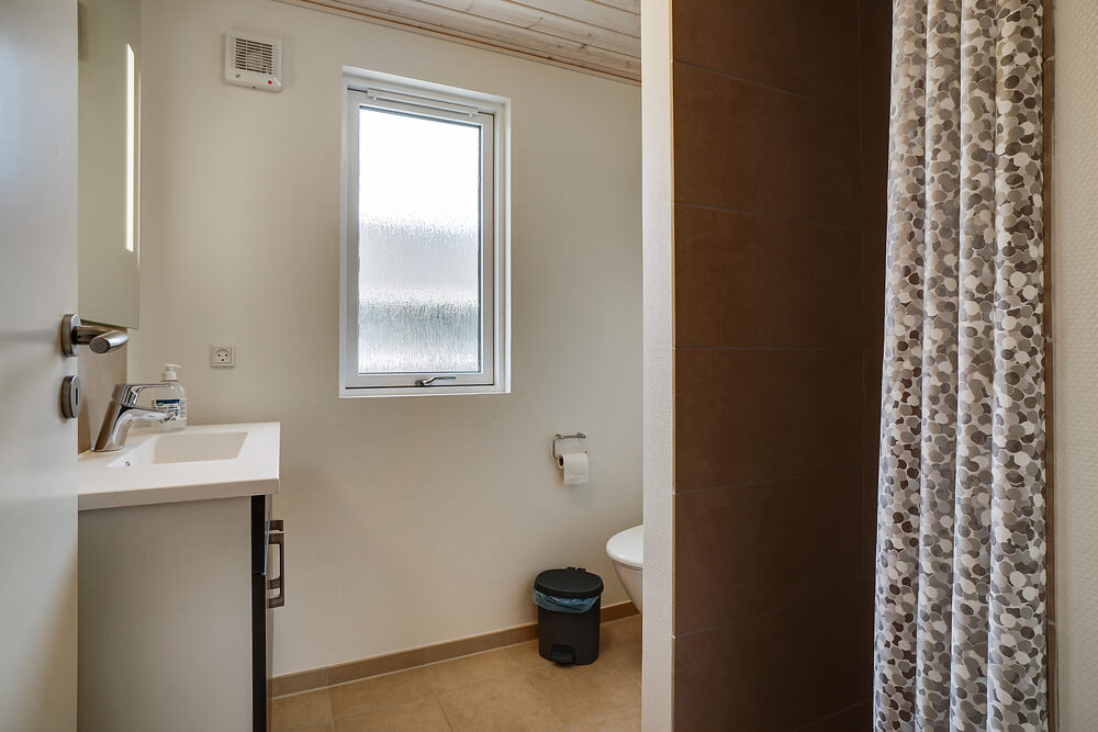 Eines der Badezimmer im Luxusferienhaus Nr. 461