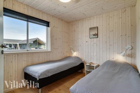 Eines der 9 Schlafzimmer im Luxusferienhaus Nr. 461