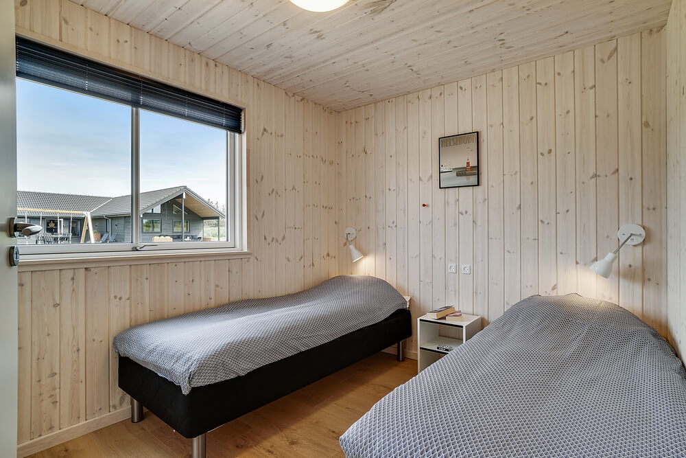 Eines der 9 Schlafzimmer im Luxusferienhaus Nr. 461
