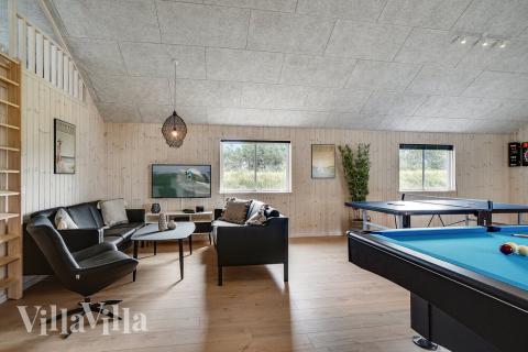 Das Luxusferienhaus 461 für 24 Personen hat einen großen Aktivitätsraum mit u. a. Billard und Darts