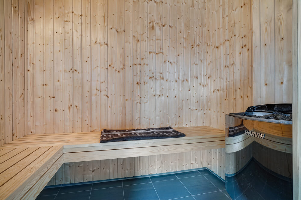 Genießen Sie die heiße Sauna im Luxusferienhaus Nr. 461 für 24 Personen
