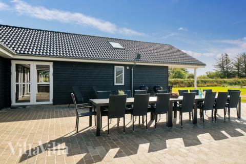 Das Luxusferienhaus Nr. 461 hat eine tolle Terrasse, die mit hochwertigen Gartenmöbeln für 24 Personen ausgestattet ist.