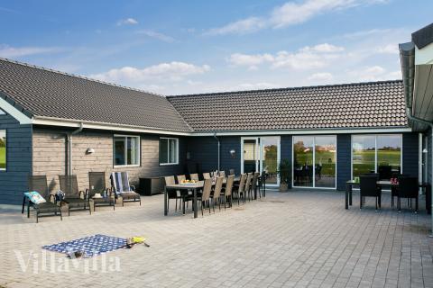 Das Luxusferienhaus Nr. 447 hat eine tolle Terrasse, die mit hochwertigen Gartenmöbeln für 24 Personen ausgestattet ist.