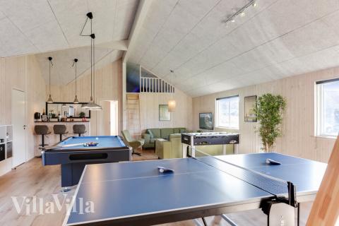 Neben den vielen schönen Stunden, die man im Poolbereich des Hauses verbringen kann, bietet das Luxusferienhaus 447 auch Spielevergnügen bei Billard/Tischtennis und Darts