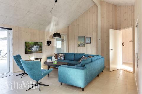 Aufenthaltsraum mit Platz für 24 im Luxusferienhaus Nr. 447.