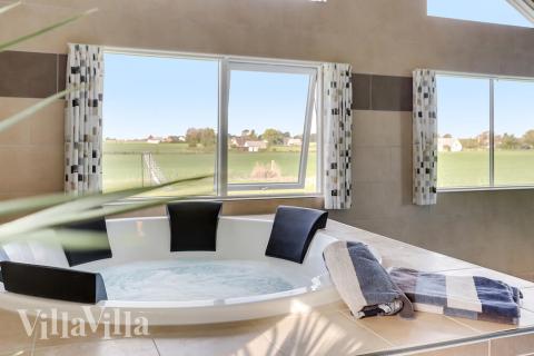 Genießen Sie den warmen Whirlpool im Luxusferienhaus Nr. 447 in Lolland/Falster/Mön