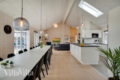 Aufenthaltsraum mit Platz für 20 im Luxusferienhaus Nr. 465.