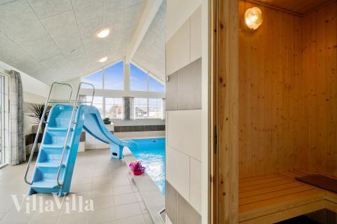 Genießen Sie die heiße Sauna im Luxusferienhaus Nr. 465 für 20 Personen