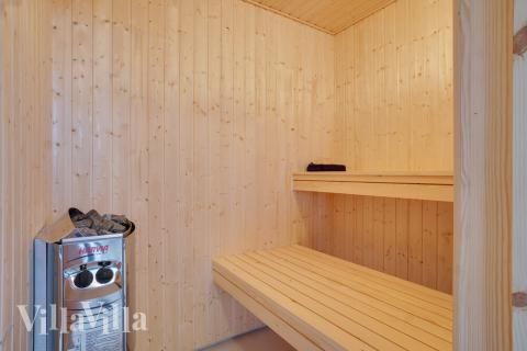 Genießen Sie die heiße Sauna im Luxusferienhaus Nr. 449 für 18 Personen