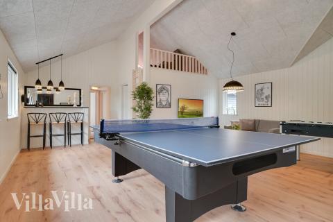 Neben den vielen schönen Stunden, die man im Poolbereich des Hauses verbringen kann, bietet das Luxusferienhaus 449 auch Spielevergnügen bei Billard/Tischtennis und Darts