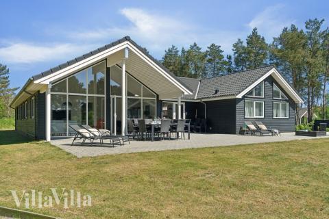Das Luxusferienhaus Nr. 449 hat eine tolle Terrasse, die mit hochwertigen Gartenmöbeln für 18 Personen ausgestattet ist.