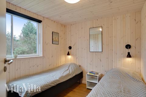 Eines der 7 Schlafzimmer im Luxusferienhaus Nr. 472