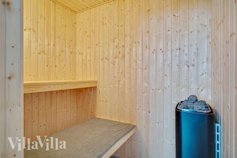 Genießen Sie die heiße Sauna im Luxusferienhaus Nr. 472 für 18 Personen