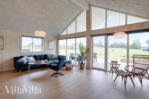 Aufenthaltsraum mit Platz für 18 im Luxusferienhaus Nr. 472.