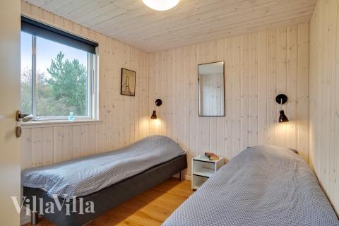 Eines der 8 Schlafzimmer im Luxusferienhaus Nr. 474