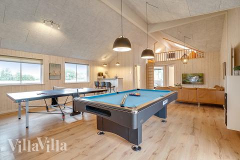 Aktivitätsraum im Luxusferienhaus Nr. 474 mit 8 Schlafzimmern und Platz für 20 Gäste.