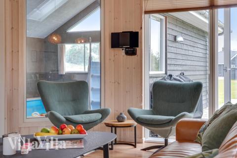 Aufenthaltsraum mit Platz für 20 im Luxusferienhaus Nr. 474.