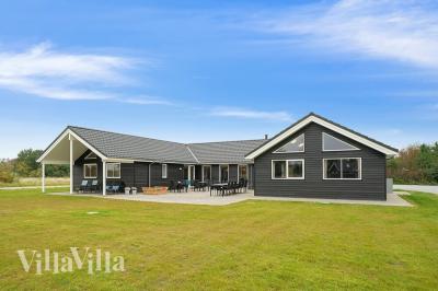Dieses schöne Poolhaus Nr. 474 mit Platz für 20 Personen liegt in Ostjütland