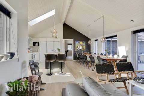 Aufenthaltsraum mit Platz für 20 im Luxusferienhaus Nr. 476.