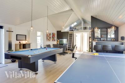 Neben den vielen schönen Stunden, die man im Poolbereich des Hauses verbringen kann, bietet das Luxusferienhaus 476 auch Spielevergnügen bei Billard/Tischtennis und Darts
