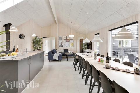 Aufenthaltsraum mit Platz für 20 im Luxusferienhaus Nr. 445.