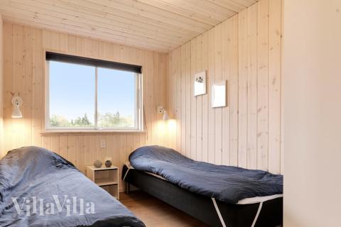 Eines der 8 Schlafzimmer im Luxusferienhaus Nr. 445