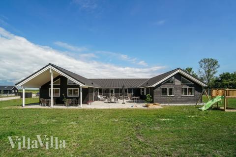 Dieses schöne Poolhaus Nr. 451 mit Platz für 20 Personen liegt in Ostjütland