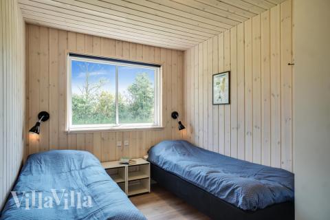 Eines der 8 Schlafzimmer im Luxusferienhaus Nr. 451