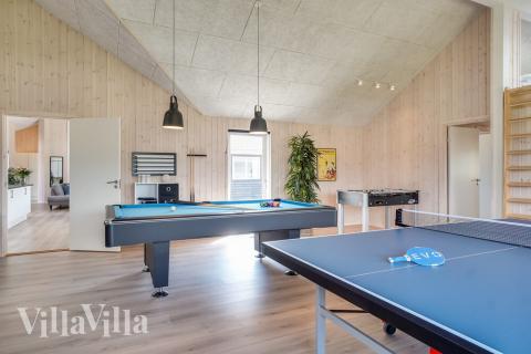 Neben den vielen schönen Stunden, die man im Poolbereich des Hauses verbringen kann, bietet das Luxusferienhaus 451 auch Spielevergnügen bei Billard/Tischtennis und Darts