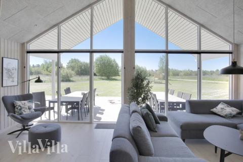 Aufenthaltsraum mit Platz für 16 im Luxusferienhaus Nr. 459.