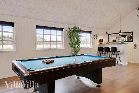 Das Luxusferienhaus 460 für 18 Personen hat einen großen Aktivitätsraum mit u. a. Billard und Darts