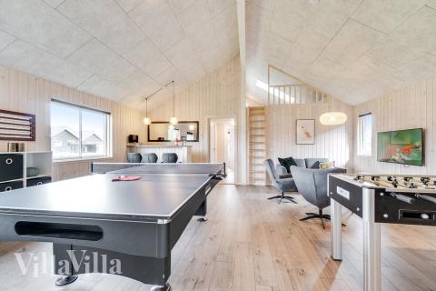 Das Luxusferienhaus 464 für 16 Personen hat einen großen Aktivitätsraum mit u. a. Billard und Darts